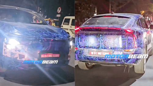 Mahindra XUV.e9 Spotted with Triple-Screen Dashboard Spy Image Revealed Mahindra XUV.e9 Spotted with Triple-Screen Dashboard Spy Image Revealed