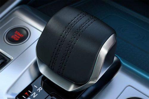 Ergonomic drive selector features cricket ball stitching across the leather
