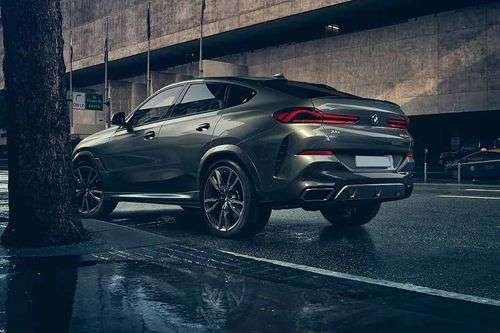 BMW X6 M50i Left Side Rear View BMW X6 M50i Left Side Rear View