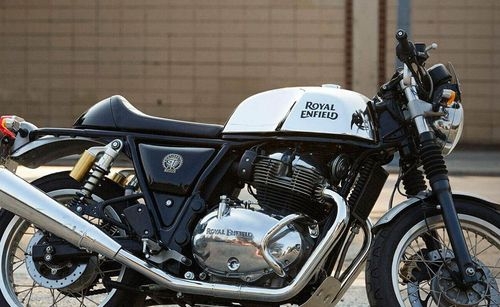 Mohammed Shami bought Royal Enfield's Continental GT650: Pacer poses with the Cafe Racer