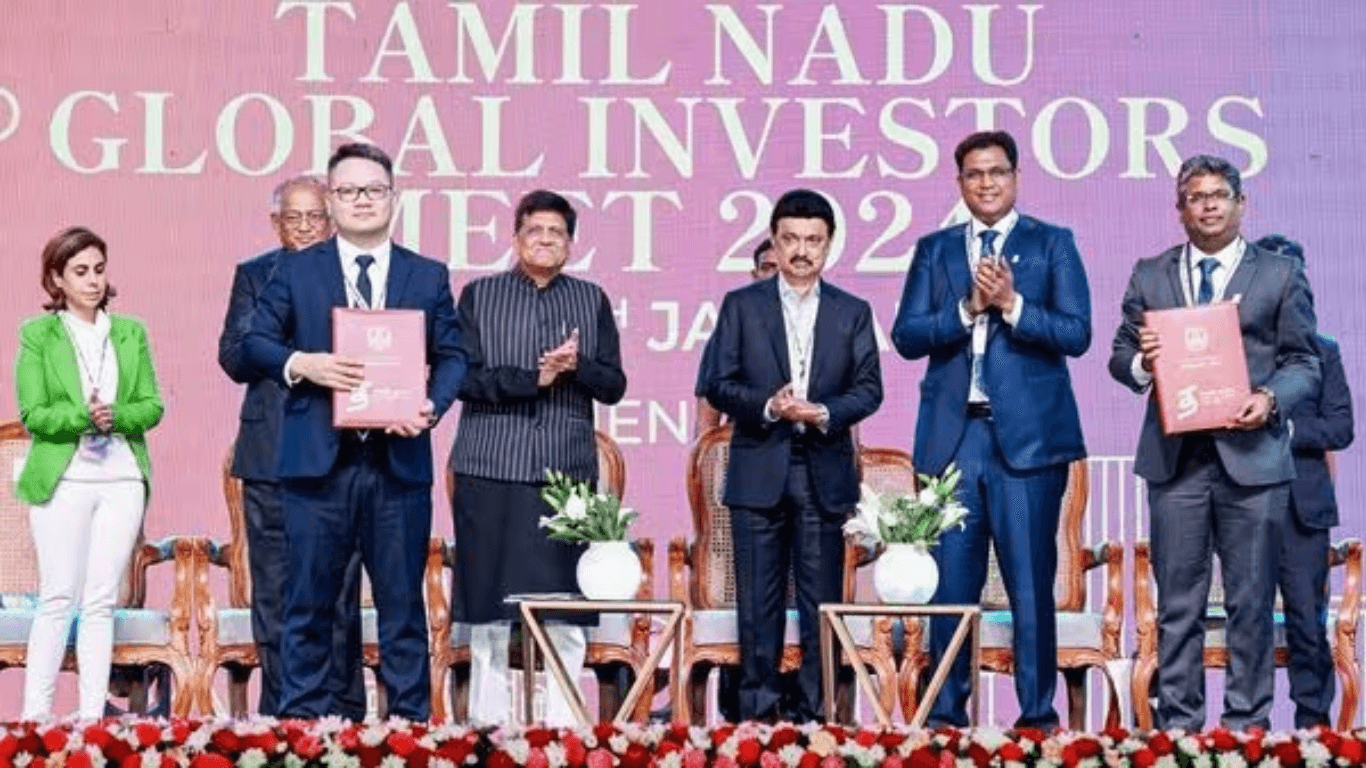 Officials from vinfast with Tamil nadu's CM MK Stalin & Union Minister Piyush Goyal at the signing of a point agreement between EV maker & State government