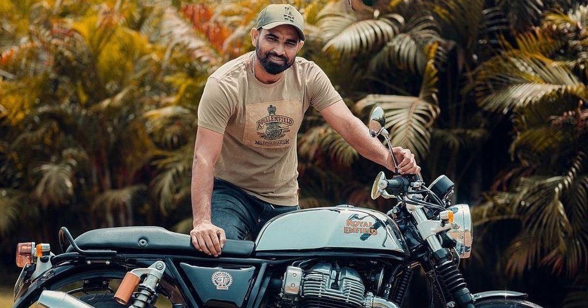 Mohammed Shami bought Royal Enfield's Continental GT650: Pacer poses with the Cafe Racer