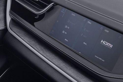 Navigate, binge or groove to your favourite beats with a front passenger interactive display.