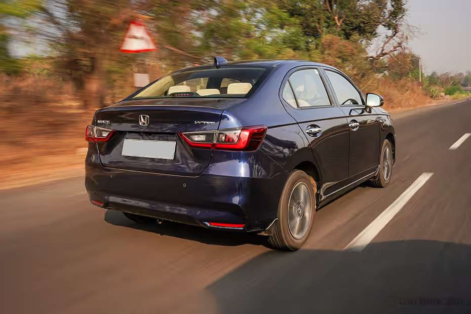 Honda Amaze Driving: Rear Right Three Quarter View Honda Amaze Driving: Rear Right Three Quarter View