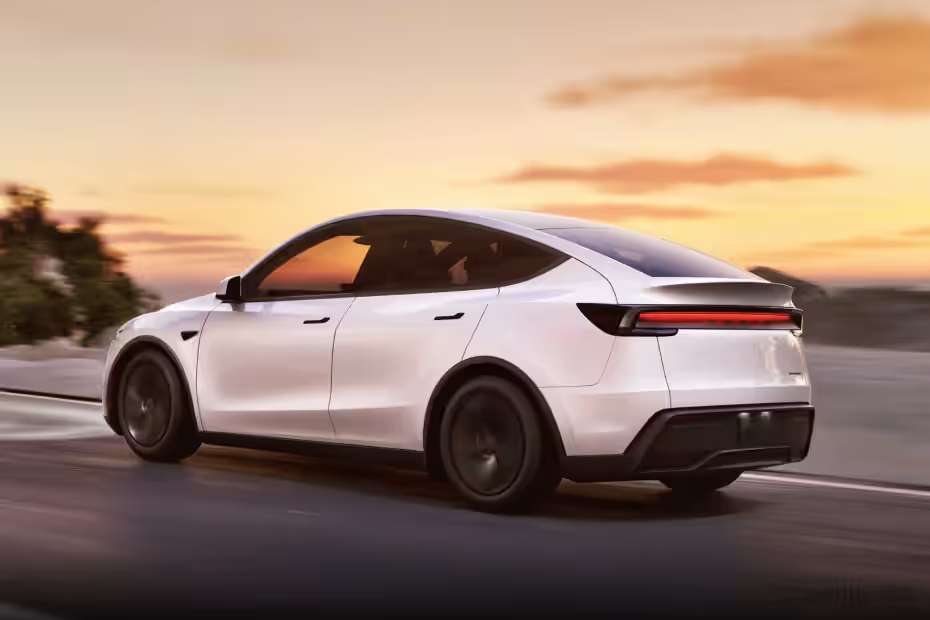 Tesla Model Y Left Rear Three Quarter Tesla Model Y Left Rear Three Quarter
