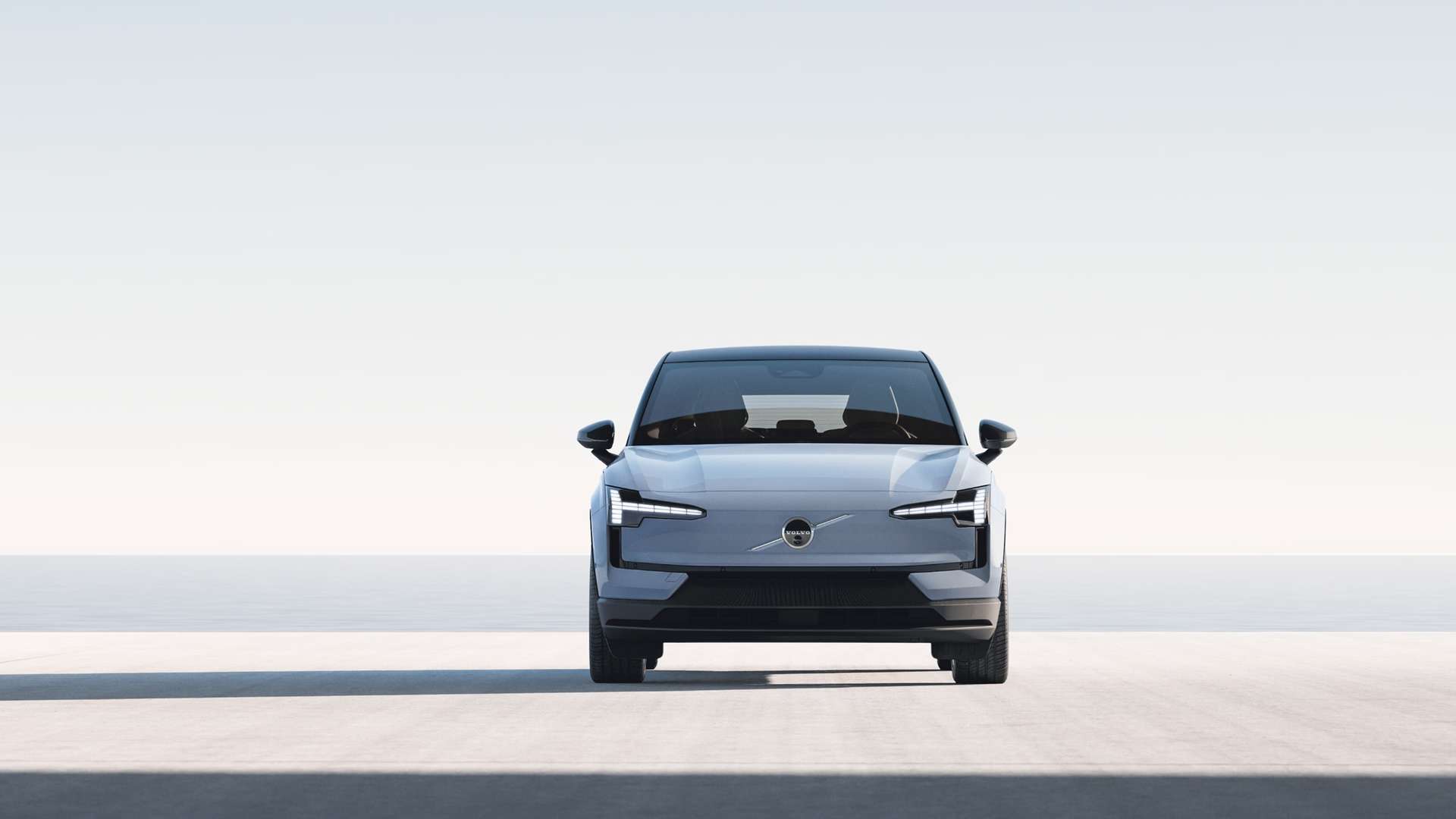 Detail shot of the 2026 Volvo EX30 Thor's Hammer LED headlights featuring a segmented pixel design and auto-high beam sensors.